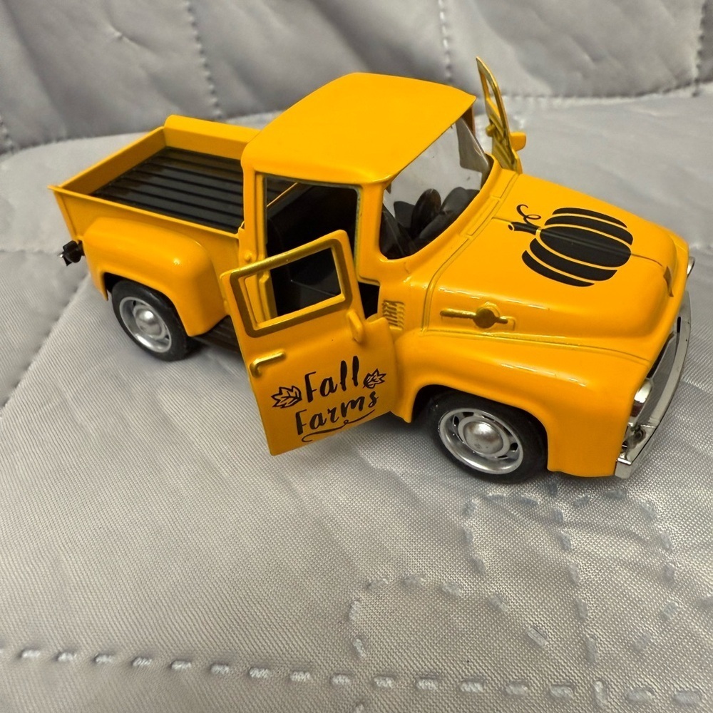 Festive Deicast collectible truck, model 1956 Ford F-100 pickup.